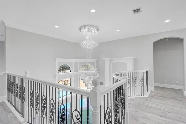 a view of entryway with wooden floor