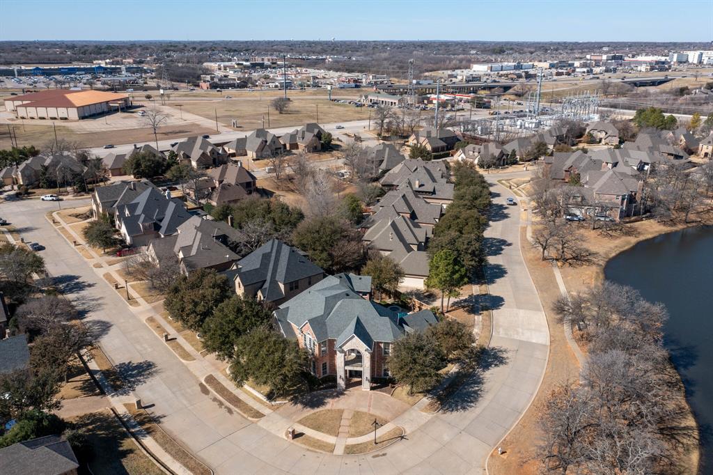 1004 Drake Drive Euless, TX 76039 - Photo 3 of 39 Aerial view highlighting property location, surrounding neighborhood, and nearby water features.