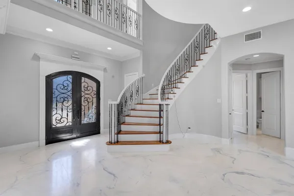 a view of entryway with stairs