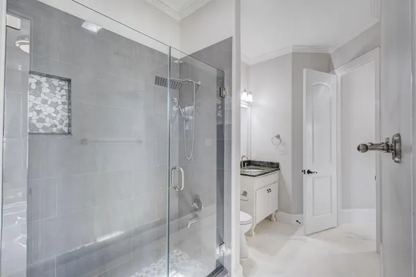 a view of a hallway view with staircase