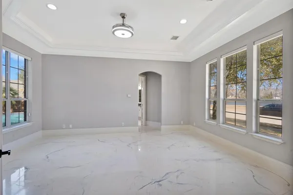 an empty room with windows