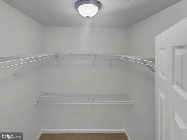 a view of small space with racks on the wall