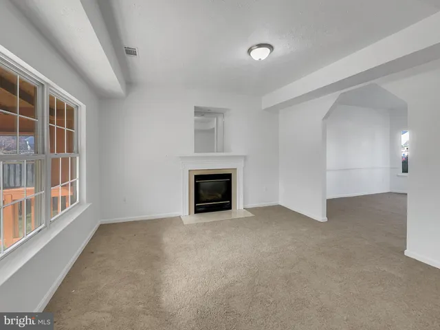 an empty room with windows