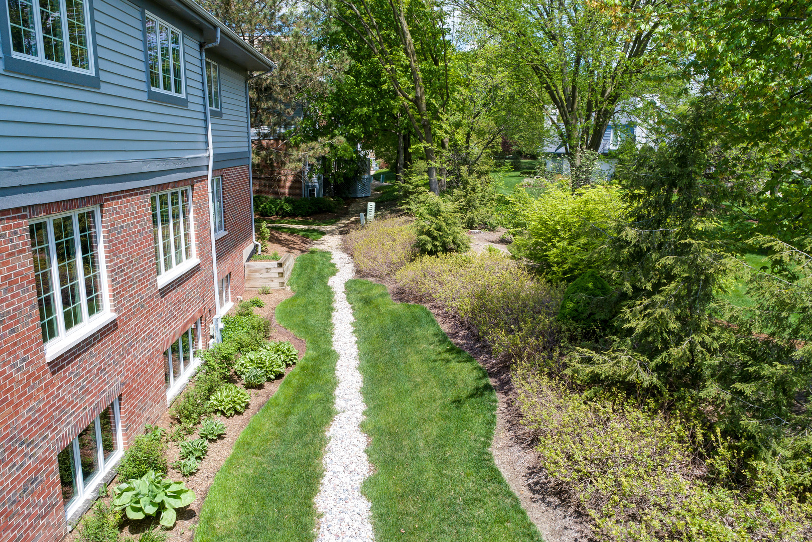 11 Southgate Court Burr Ridge, IL 60527 - Photo 35 of 39 a view of a house with a yard and pathway