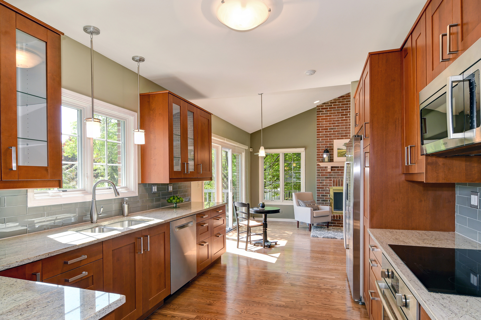 11 Southgate Court Burr Ridge, IL 60527 - Photo 10 of 39 a large kitchen with stainless steel appliances a large window and a counter space