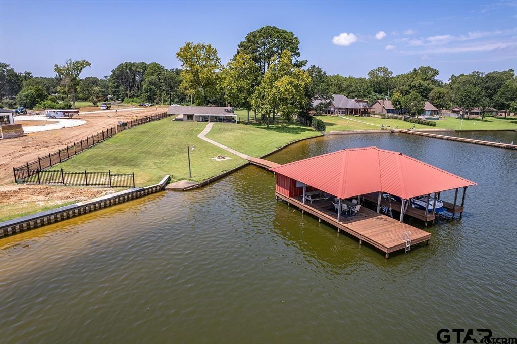 17777 Slack Road Whitehouse, TX 75791 - Photo 1 of 2 a swimming pool with outdoor seating and yard
