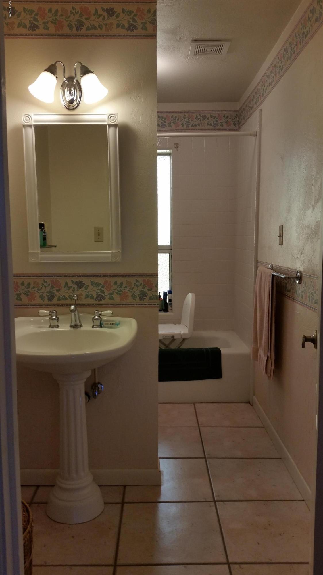 791 West 4th Street South Snowflake, AZ 85937 - Photo 25 of 46 a bathroom with a sink and a mirror