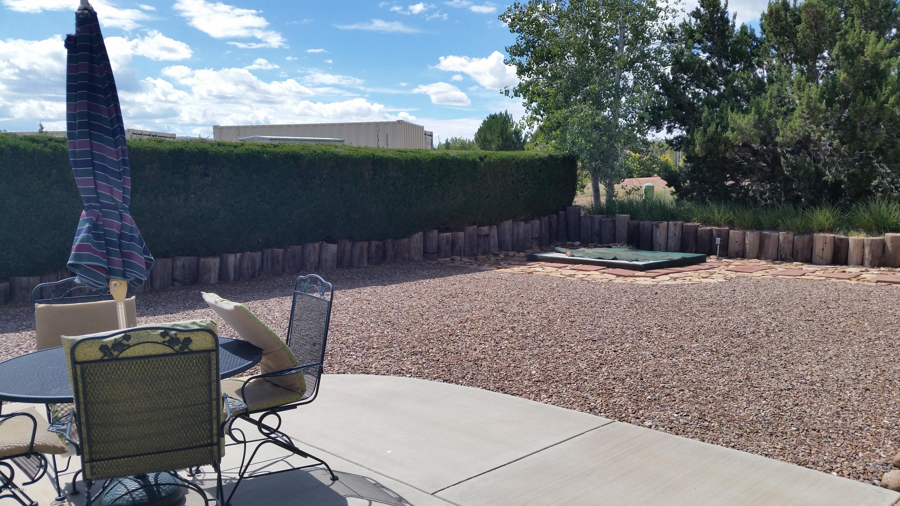 791 West 4th Street South Snowflake, AZ 85937 - Photo 38 of 46 a backyard of a house with table and chairs