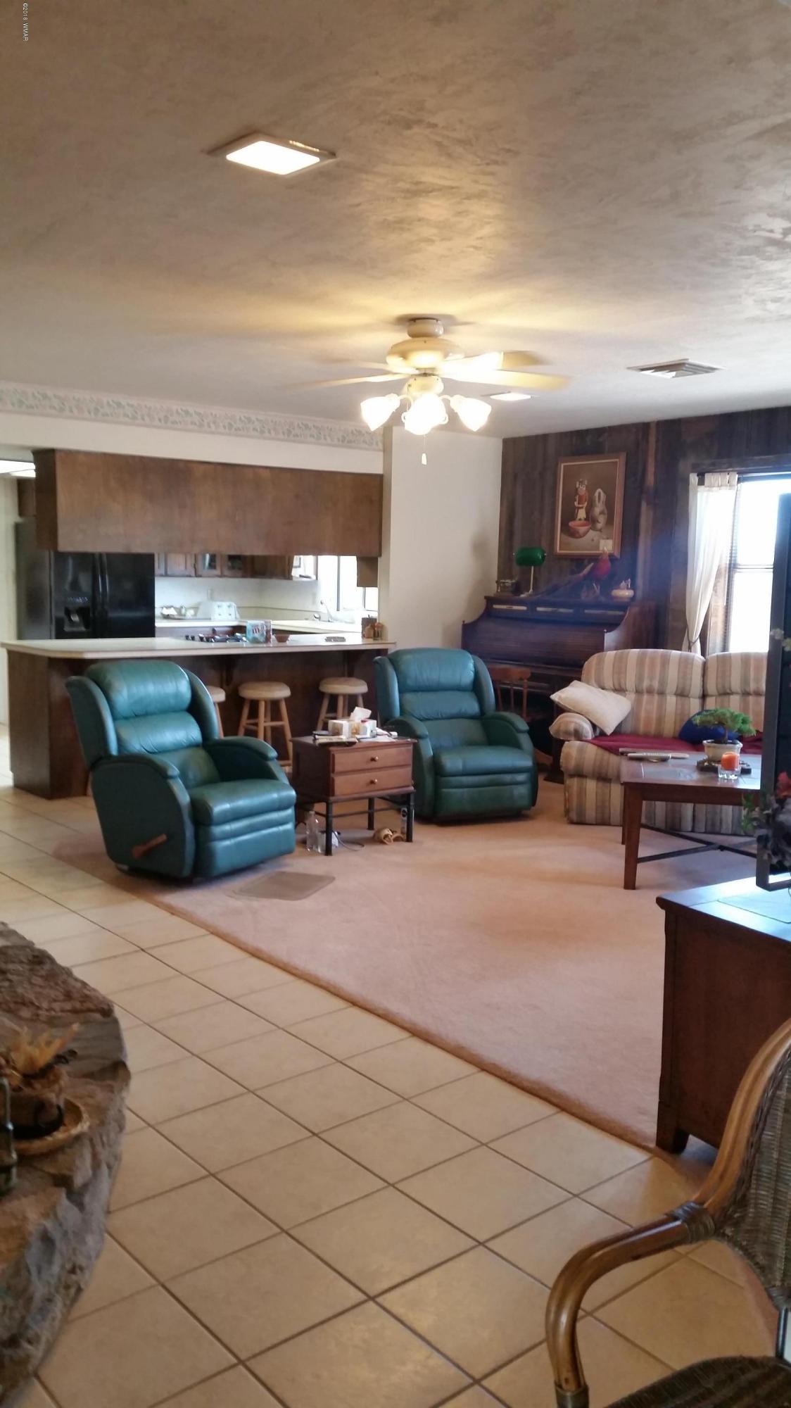 791 West 4th Street South Snowflake, AZ 85937 - Photo 7 of 46 a living room with lots of furniture and kitchen view