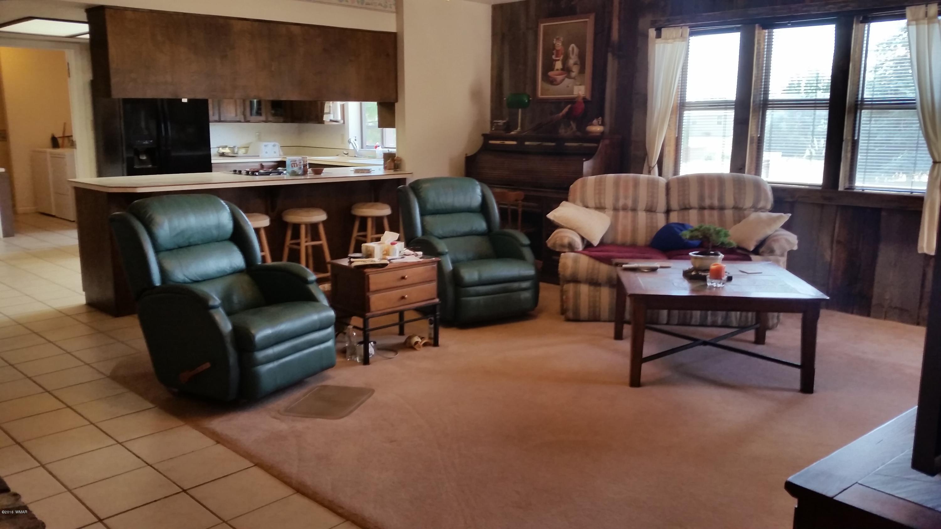 791 West 4th Street South Snowflake, AZ 85937 - Photo 8 of 46 a living room with furniture and windows