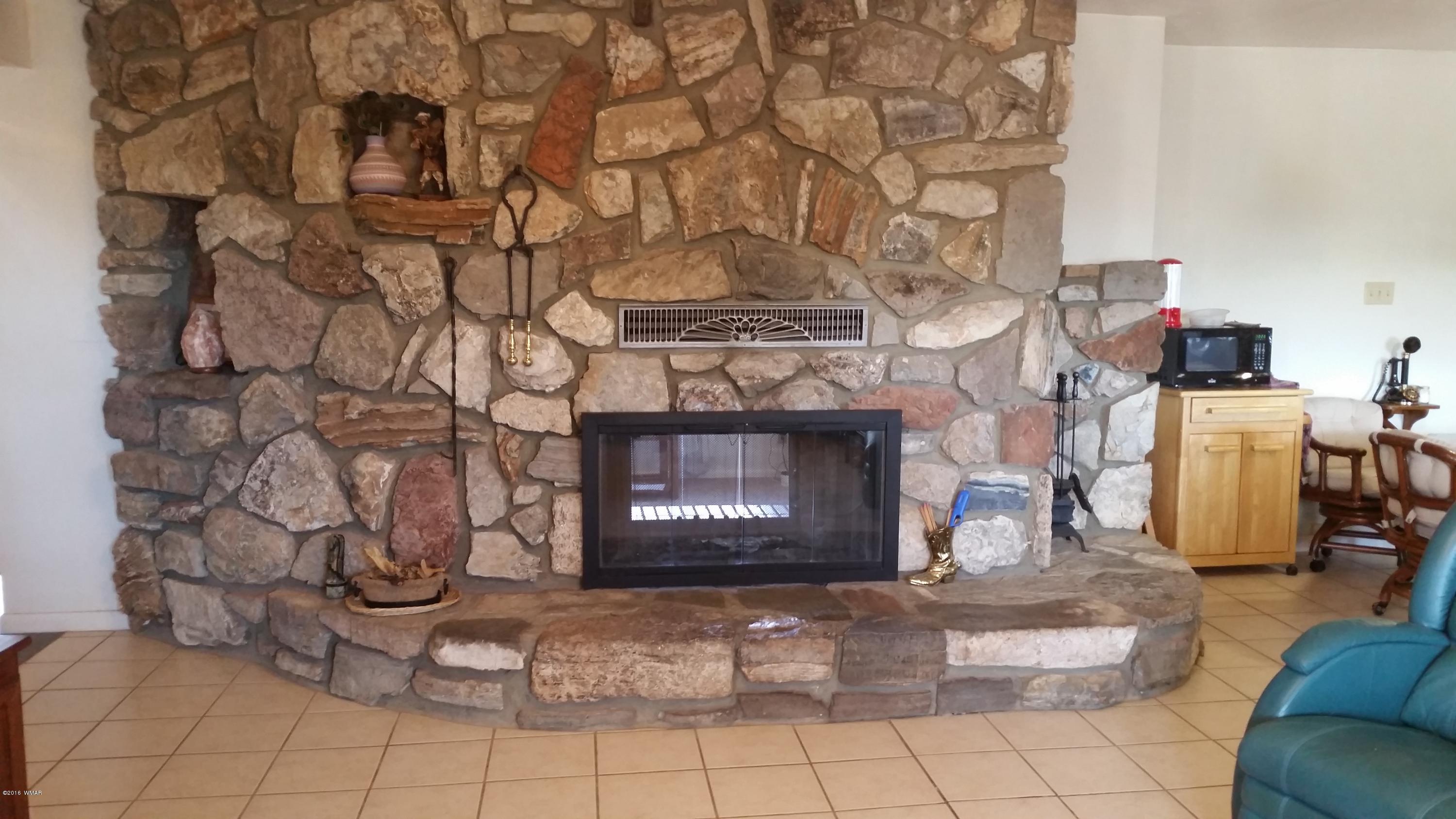 791 West 4th Street South Snowflake, AZ 85937 - Photo 10 of 46 a living room with fireplace