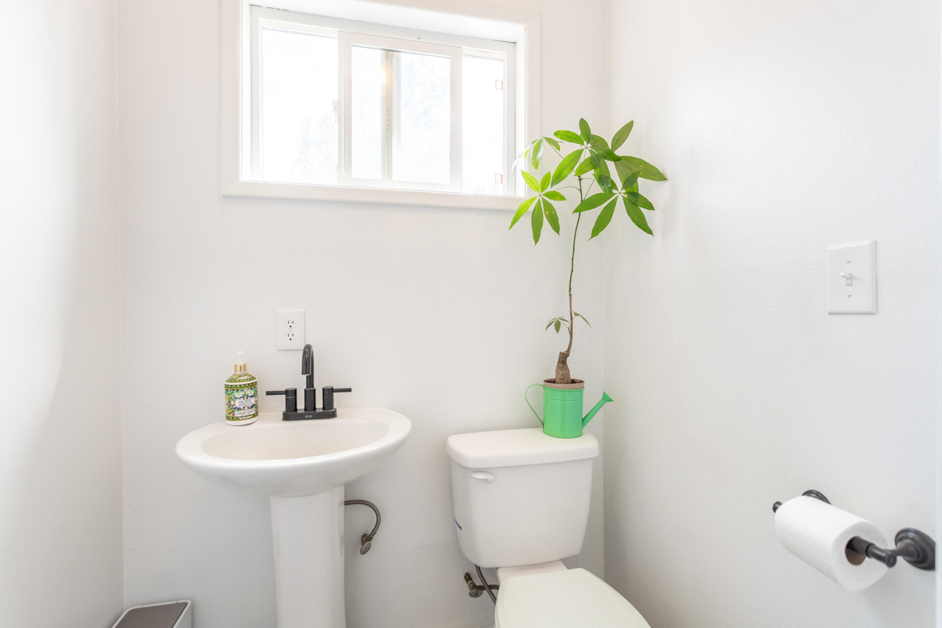 8132 Maynard Road Palo Cedro, CA 96073 - Photo 14 of 35 a bathroom with a toilet sink and mirror