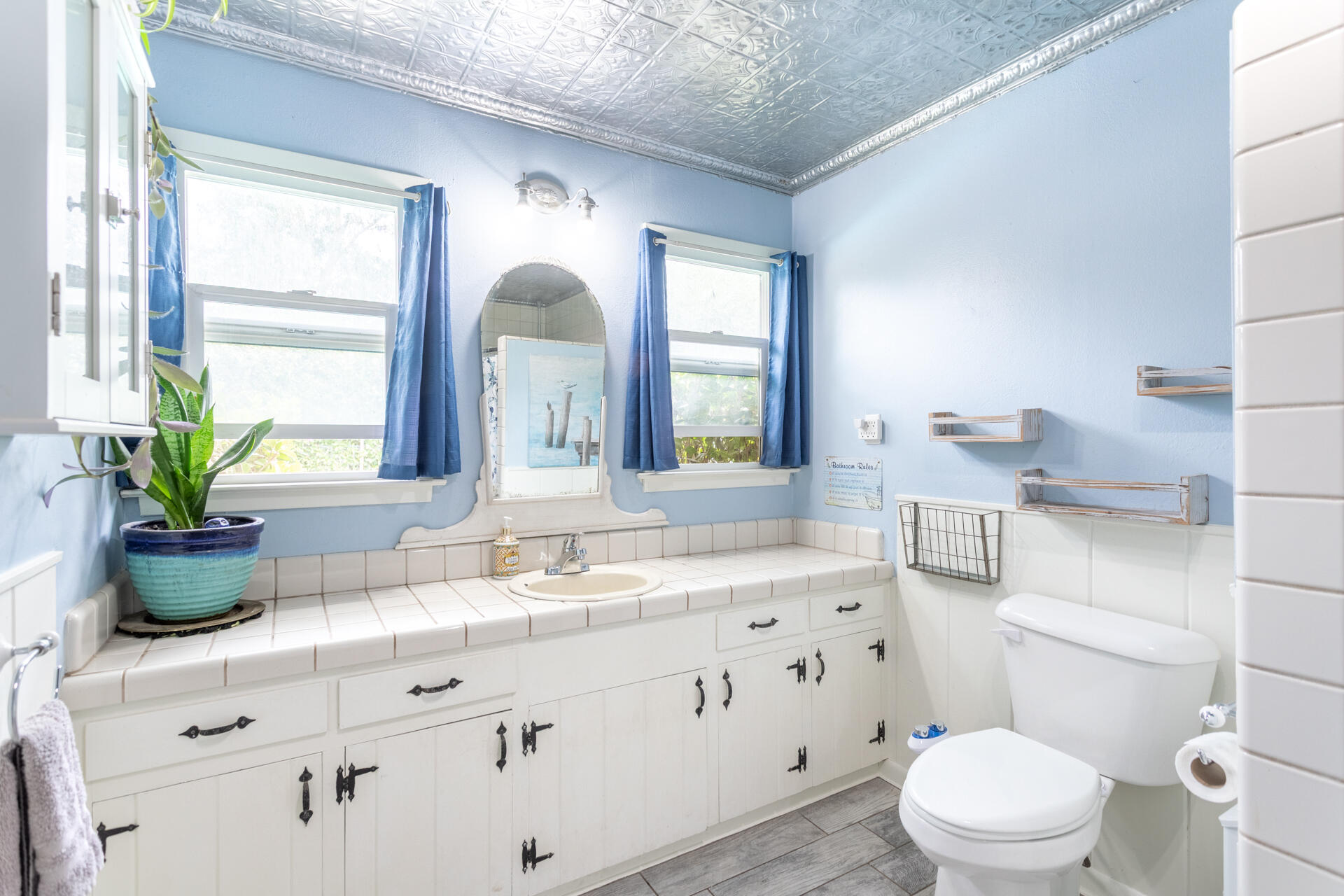8132 Maynard Road Palo Cedro, CA 96073 - Photo 18 of 35 a bathroom with a double vanity sink mirror and toilet