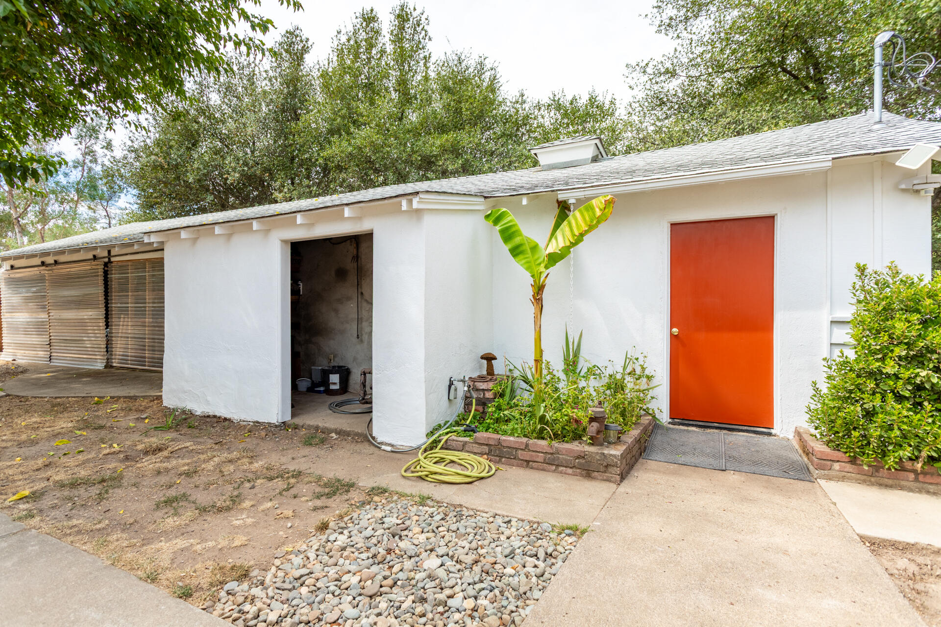 8132 Maynard Road Palo Cedro, CA 96073 - Photo 27 of 35 a view of a house with potted plants