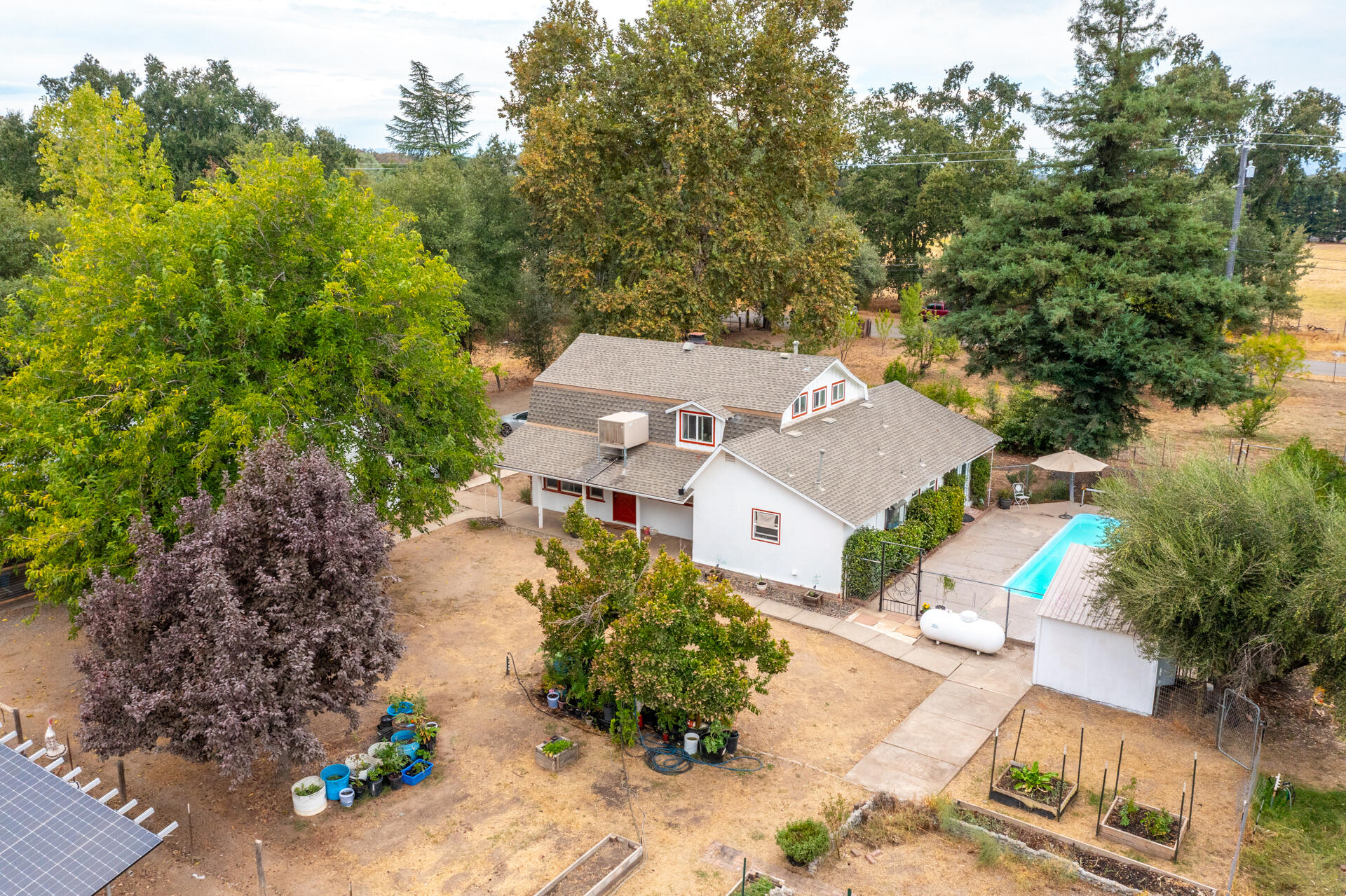 8132 Maynard Road Palo Cedro, CA 96073 - Photo 28 of 35 an aerial view of a house with a yard