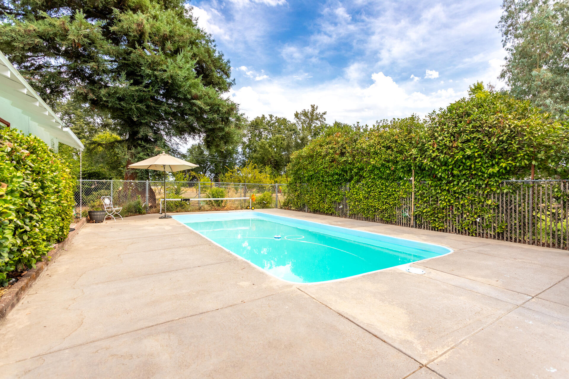 8132 Maynard Road Palo Cedro, CA 96073 - Photo 3 of 35 a view of outdoor space and swimming pool