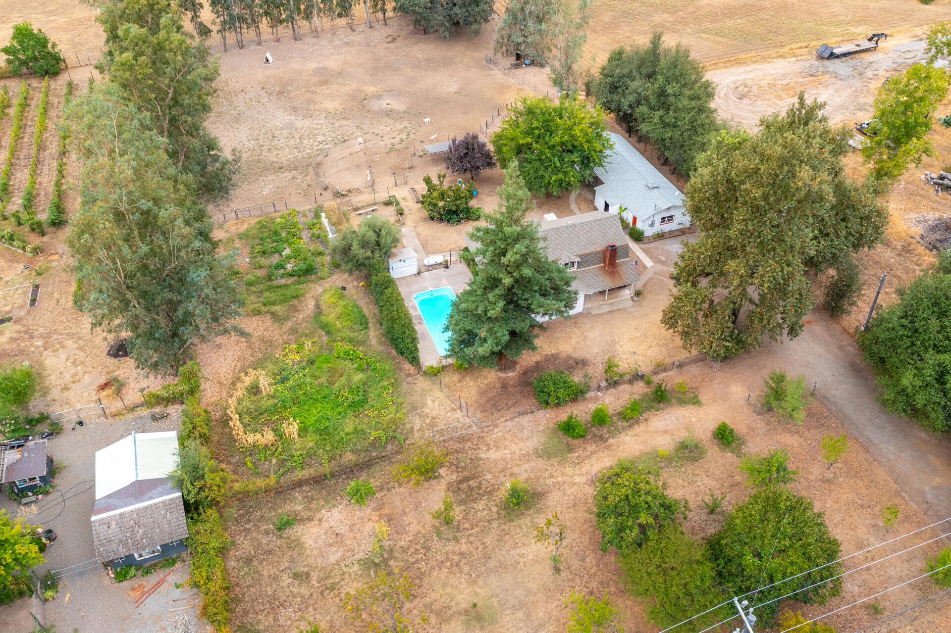 8132 Maynard Road Palo Cedro, CA 96073 - Photo 32 of 35 an aerial view of residential house with outdoor space