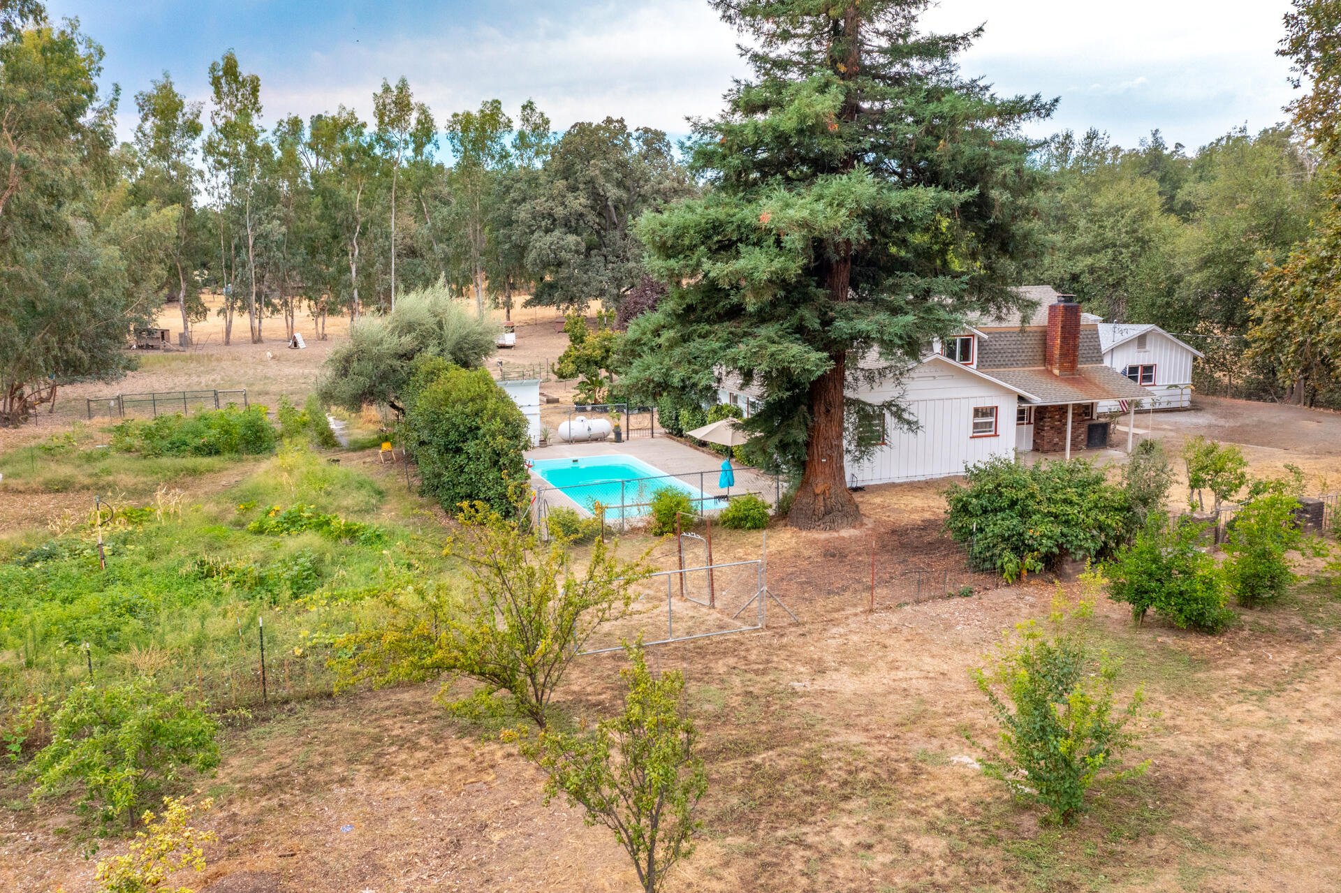 8132 Maynard Road Palo Cedro, CA 96073 - Photo 33 of 35 an aerial view of residential house with outdoor space