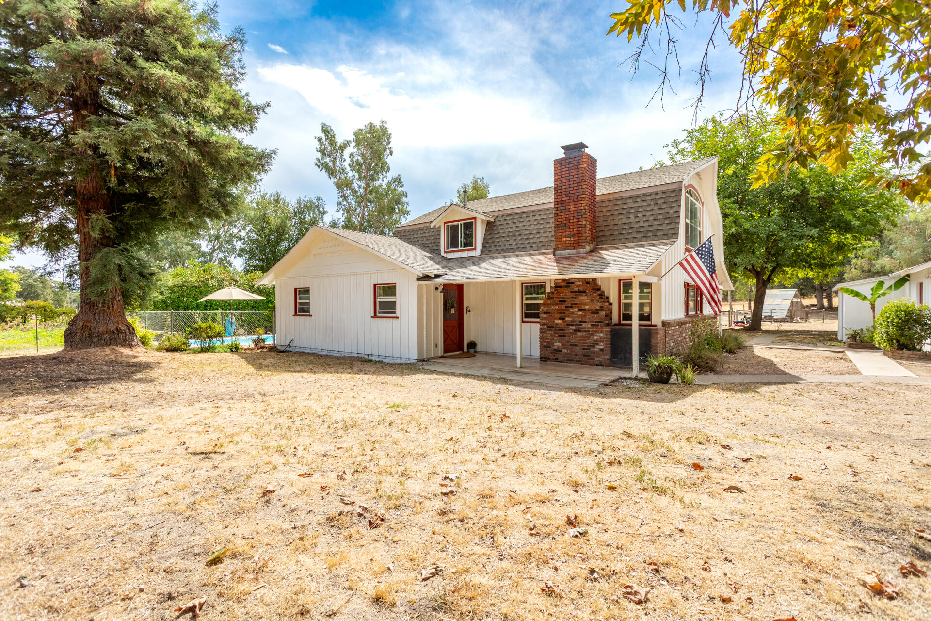 8132 Maynard Road Palo Cedro, CA 96073 - Photo 35 of 35 a front view of a house with a yard
