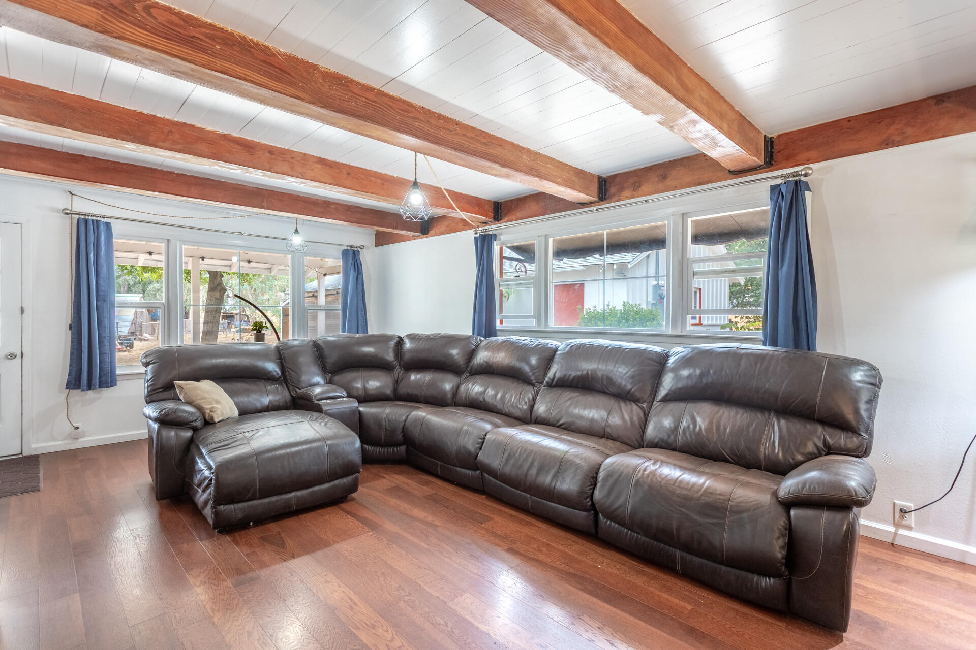 8132 Maynard Road Palo Cedro, CA 96073 - Photo 5 of 35 a living room with furniture and a large window