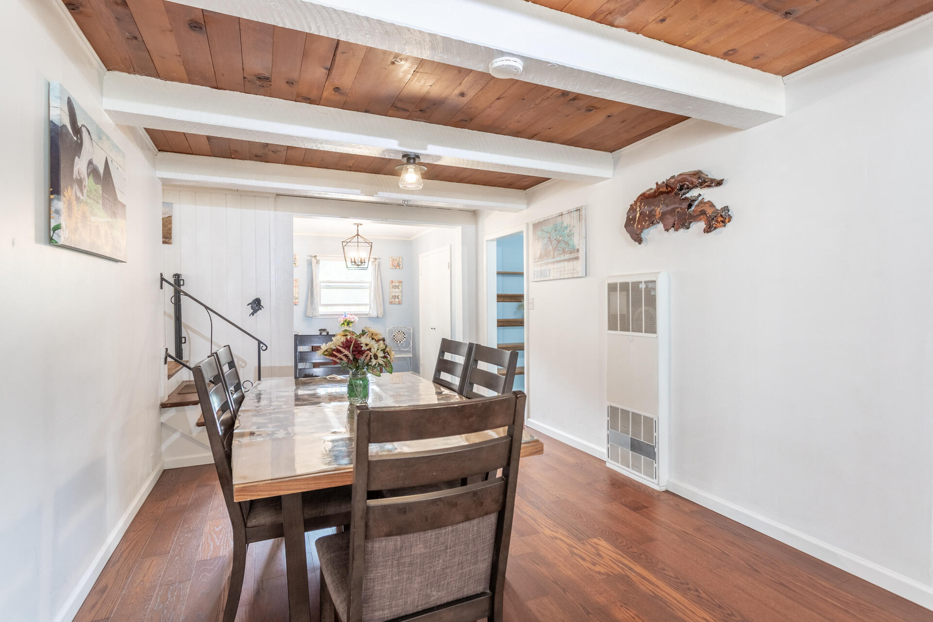 8132 Maynard Road Palo Cedro, CA 96073 - Photo 8 of 35 a view of a dining room with furniture and a potted plant