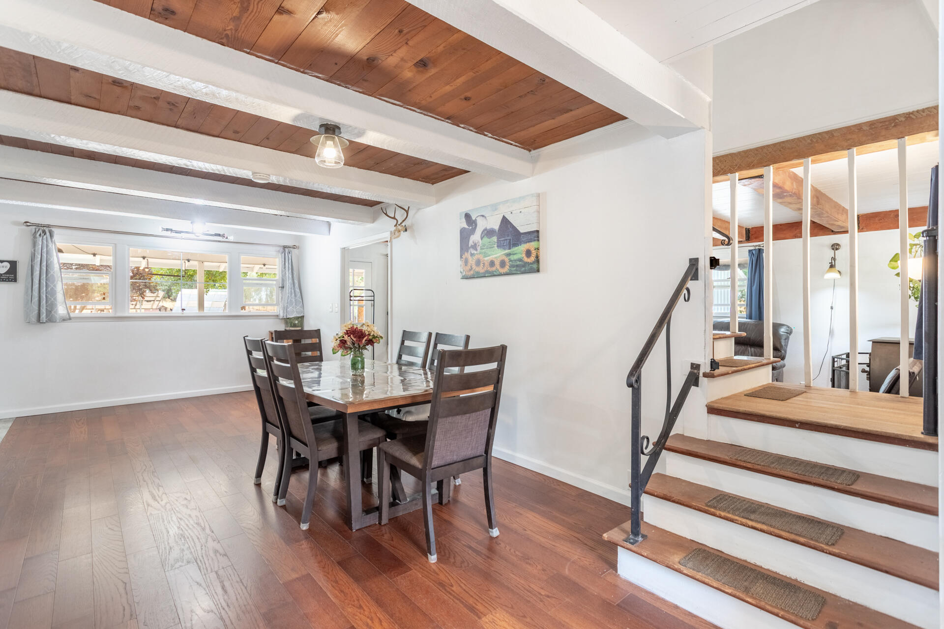 8132 Maynard Road Palo Cedro, CA 96073 - Photo 9 of 35 a view of a dining room with furniture and a large window