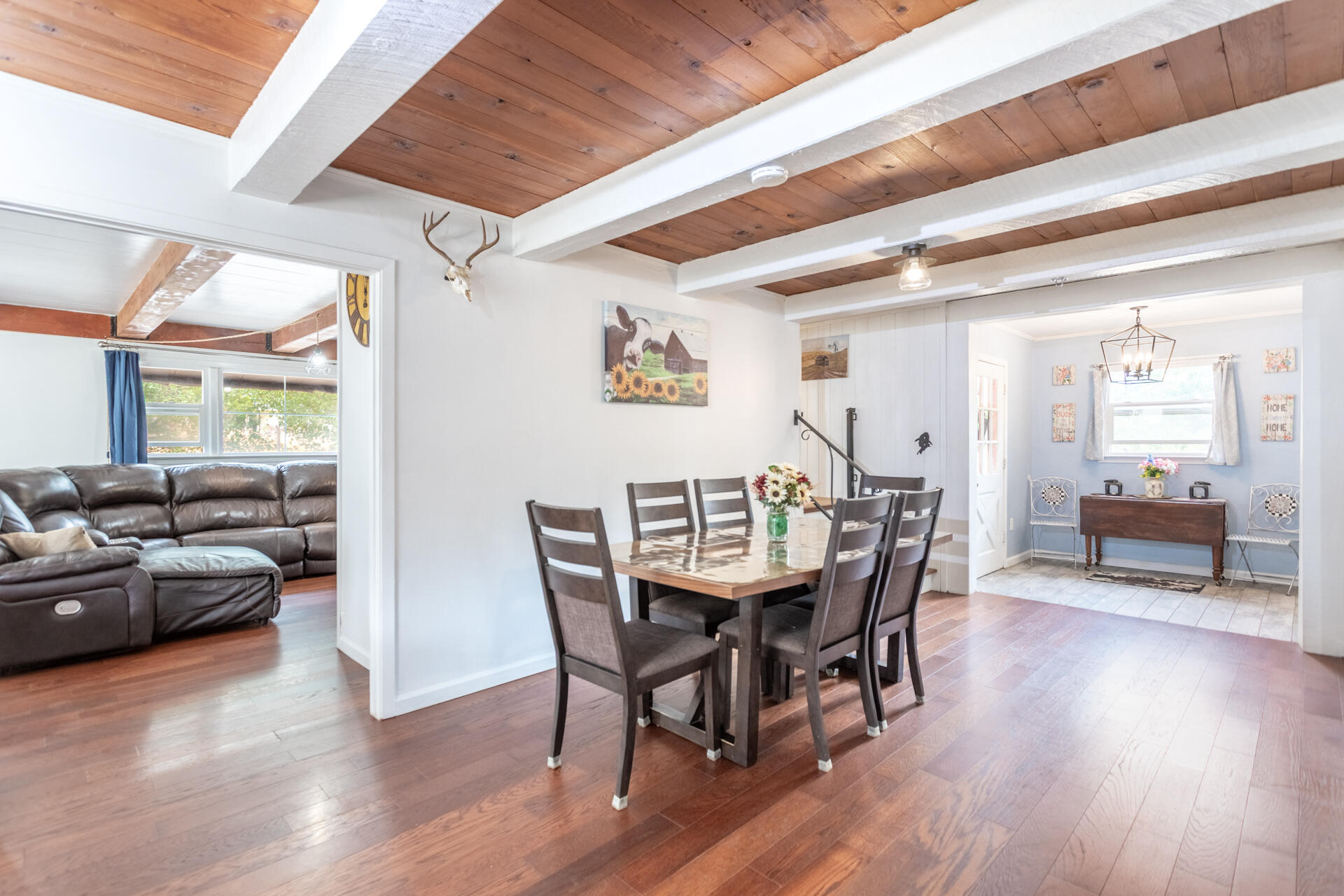 8132 Maynard Road Palo Cedro, CA 96073 - Photo 10 of 35 a view of a dining room with furniture and wooden floor