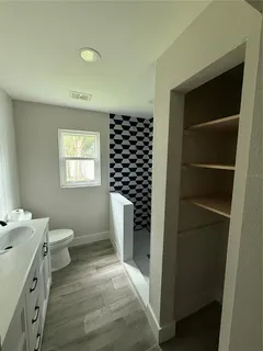 a view of a room with racks on the wall