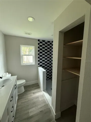 a view of a room with racks on the wall