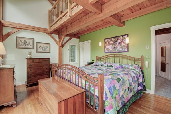 37 Wedgewood Road Stow, MA 01775 - Photo 14 of 30 a bedroom with a bed a dresser with wooden floor