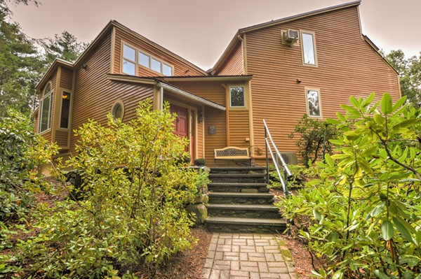37 Wedgewood Road Stow, MA 01775 - Photo 2 of 30 a view of a house with a small yard and plants