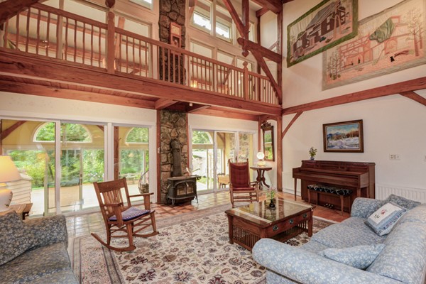 37 Wedgewood Road Stow, MA 01775 - Photo 3 of 30 a living room with furniture a fireplace and a large window