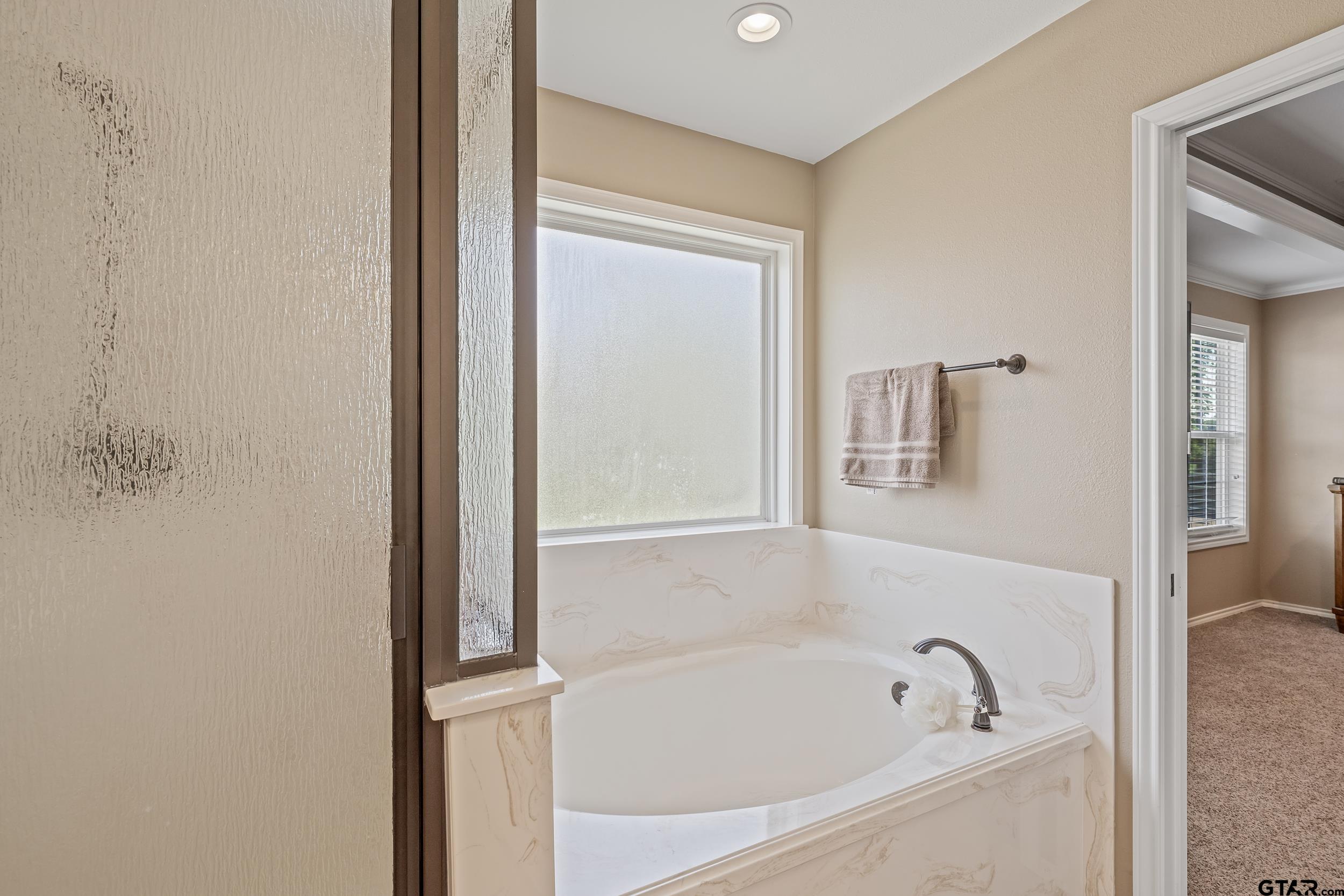 200 David Hawkins, TX 75765 - Photo 15 of 36 a white bath tub sitting next to a window