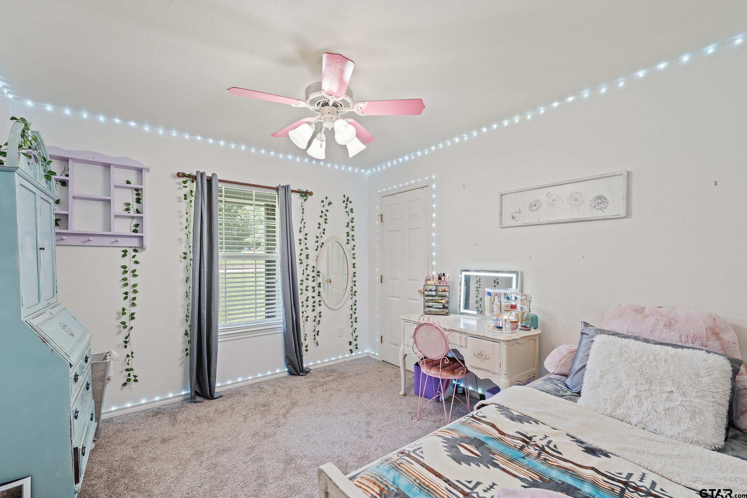 200 David Hawkins, TX 75765 - Photo 18 of 36 a bed room with a bed furniture and a flat screen tv