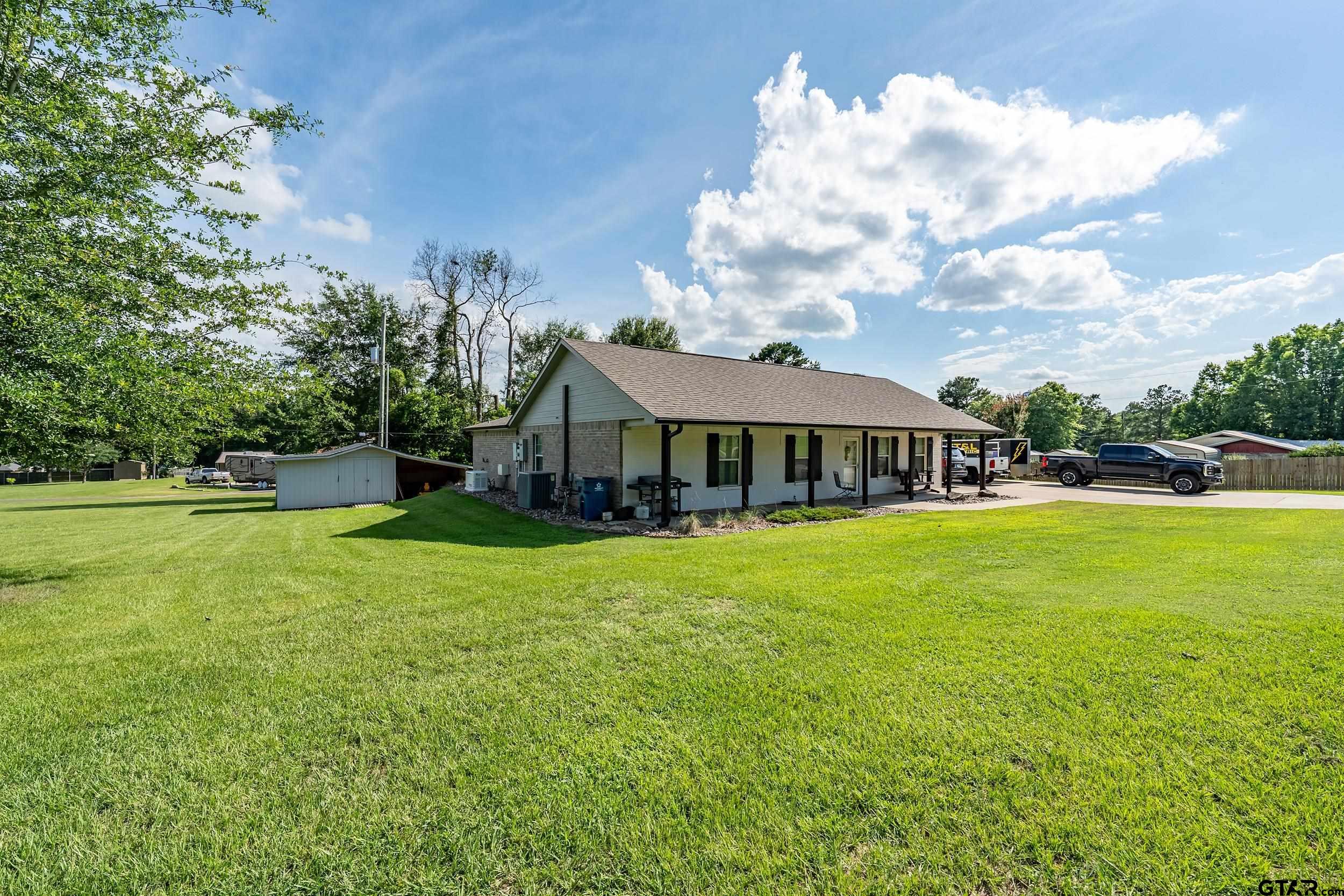 200 David Hawkins, TX 75765 - Photo 29 of 36 a front view of a house with garden