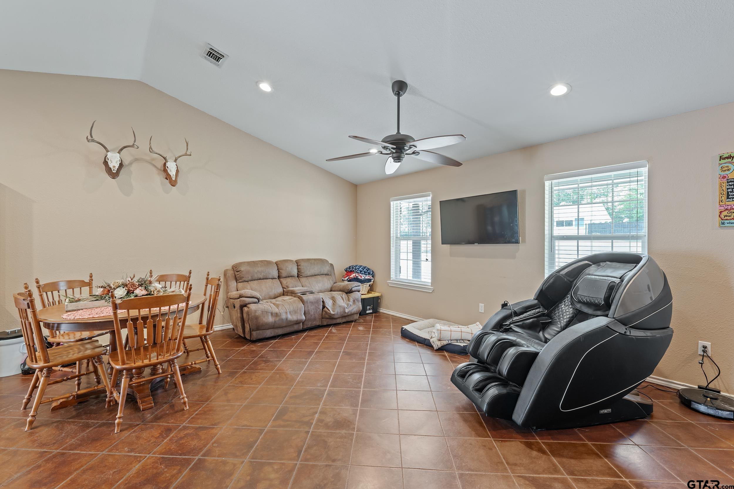 200 David Hawkins, TX 75765 - Photo 36 of 36 a living room with furniture and a flat screen tv