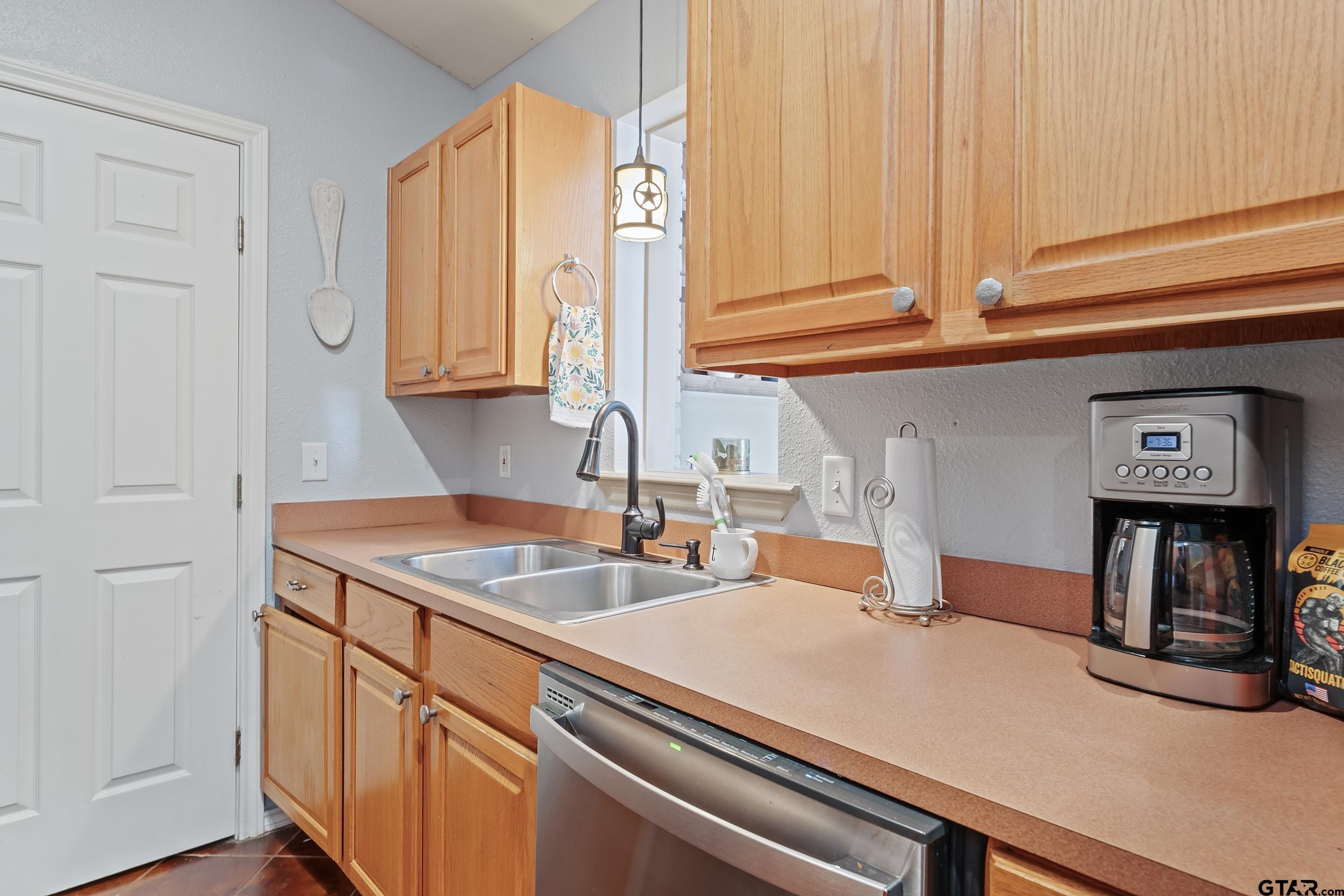 200 David Hawkins, TX 75765 - Photo 8 of 36 a kitchen with a sink and cabinets