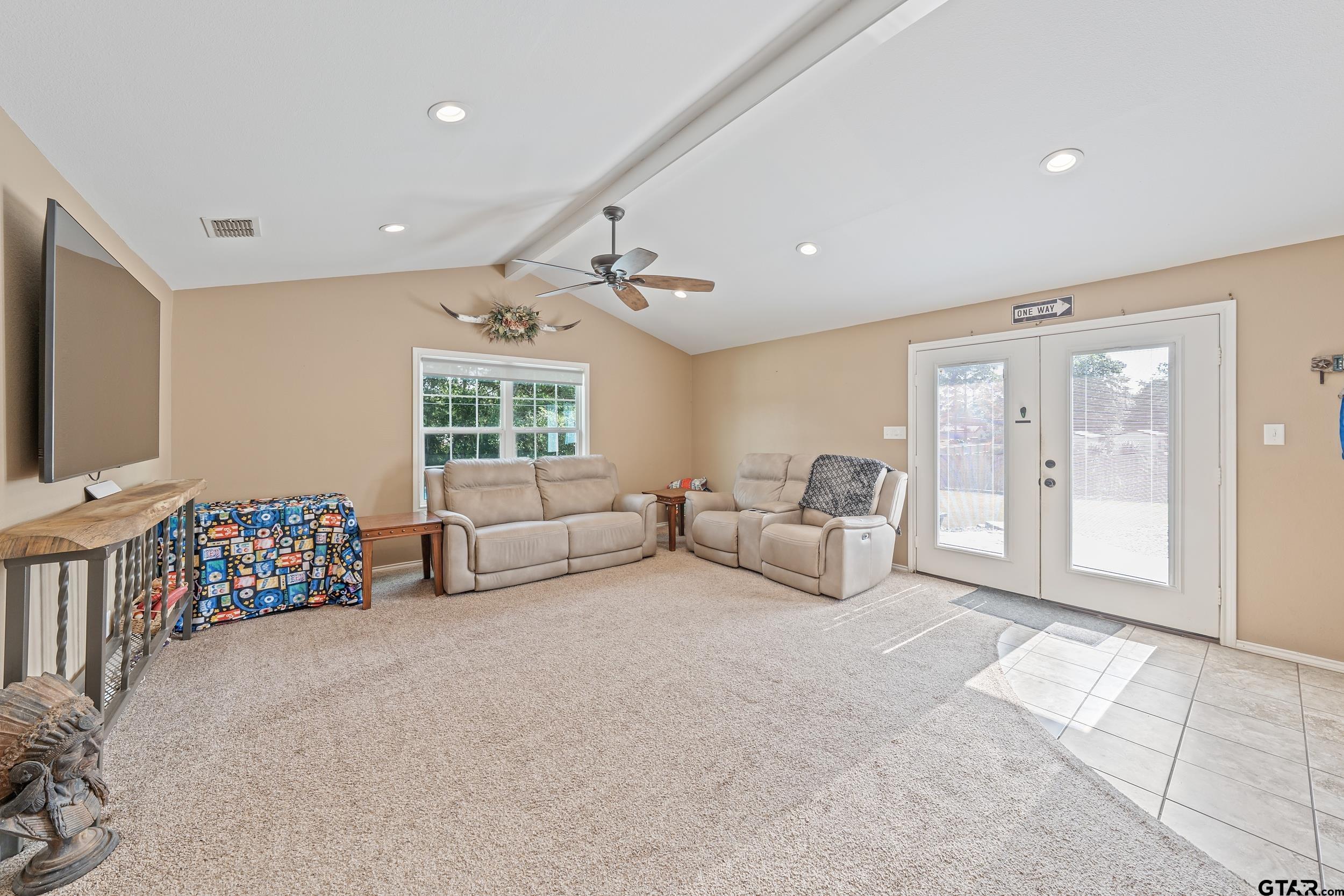 200 David Hawkins, TX 75765 - Photo 10 of 36 a living room with furniture and a flat screen tv