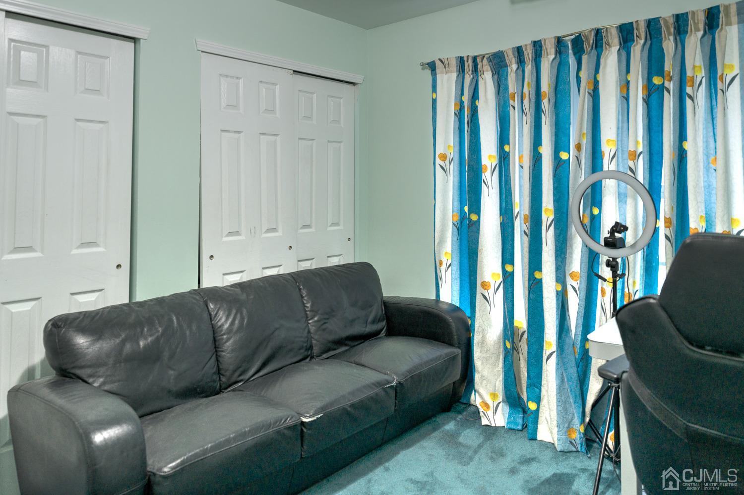 110 Ravine Road Green Brook, NJ 08812 - Photo 26 of 38 a living room with furniture and a couch