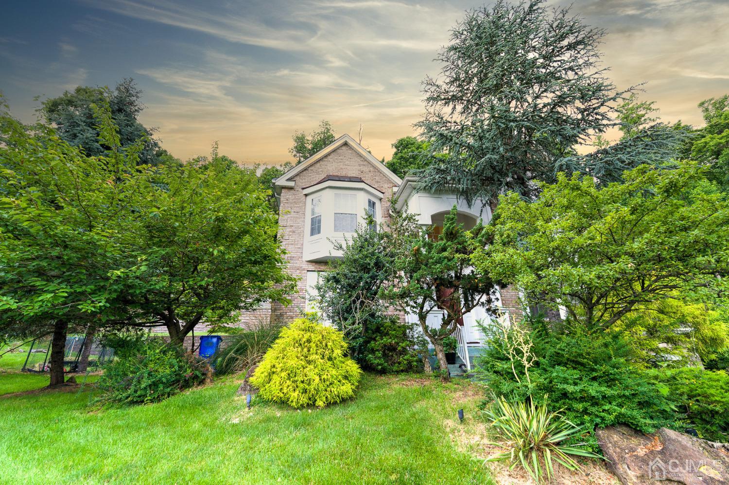 110 Ravine Road Green Brook, NJ 08812 - Photo 38 of 38 a view of a garden with a house