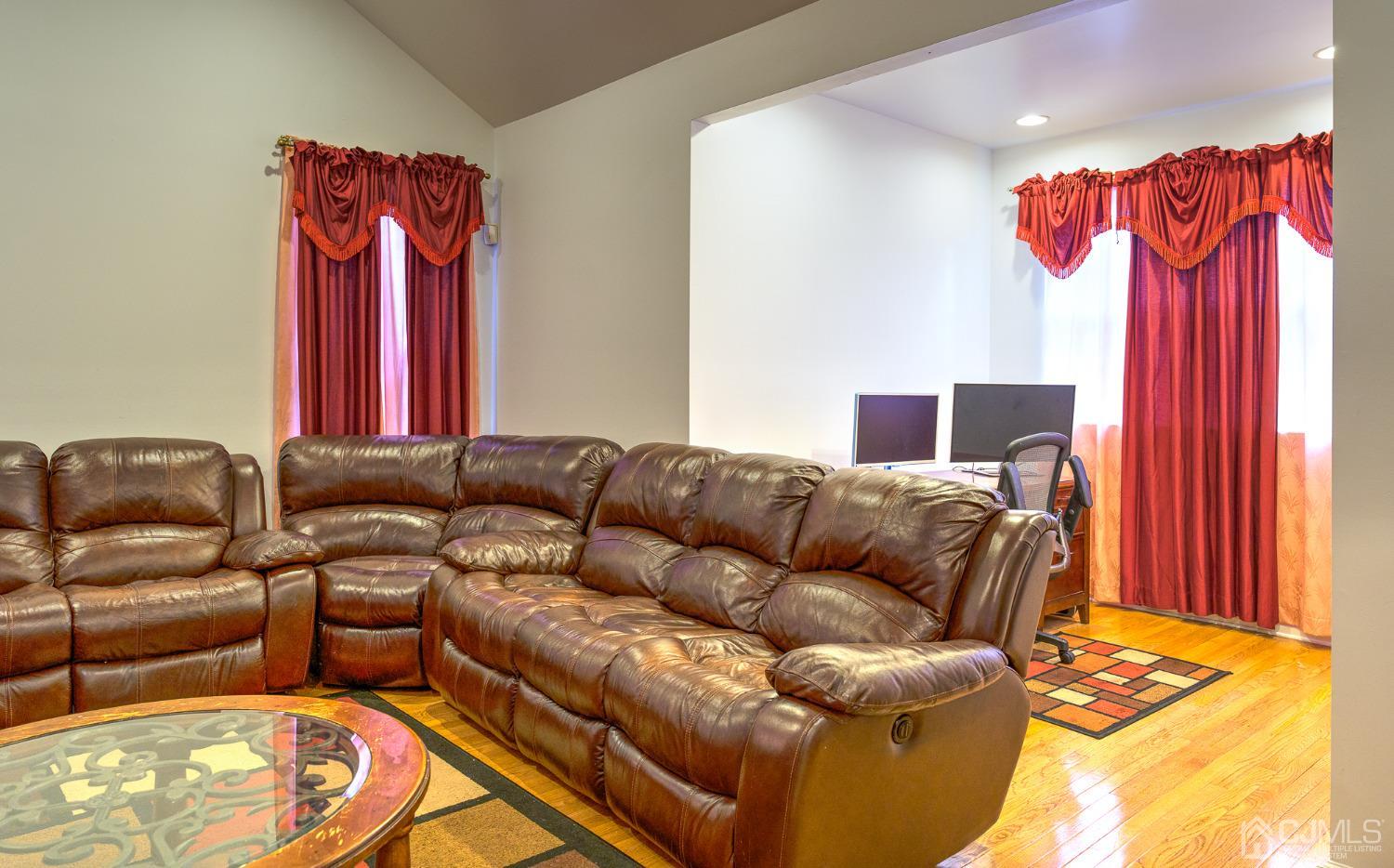 110 Ravine Road Green Brook, NJ 08812 - Photo 4 of 38 a living room with furniture and a couch