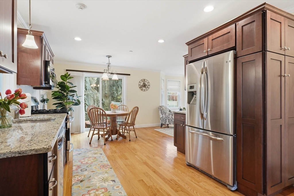 2 B Gates Lane, Unit B Wakefield, MA 01880 - Photo 5 of 42 a view of a dining room with furniture window and wooden floor