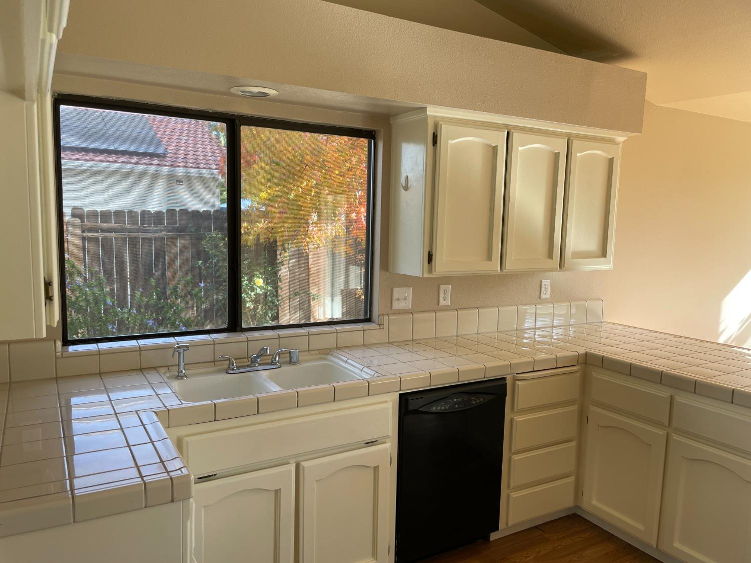 2586 Barstow Avenue Clovis, CA 93611 - Photo 8 of 10 a kitchen with a sink and a window