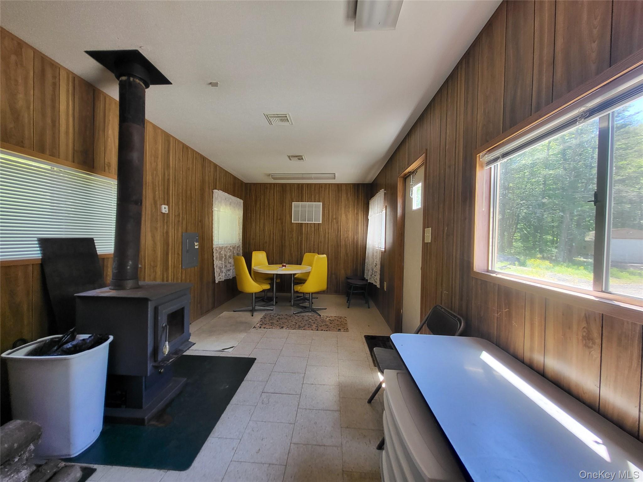 308 William Brown Road Fremont, NY 12741 - Photo 27 of 33 a living room with furniture and a fireplace
