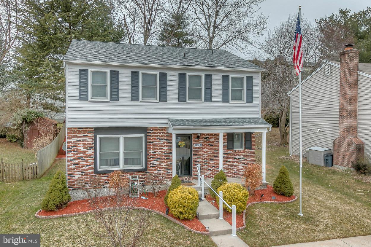 9408 Oak White Road Baltimore, MD 21236 - Photo 2 of 30 a front view of a house with garden