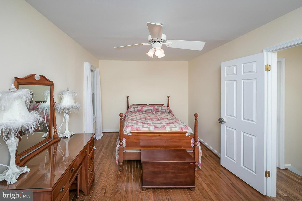 9408 Oak White Road Baltimore, MD 21236 - Photo 27 of 30 a living room with furniture and a flat screen tv