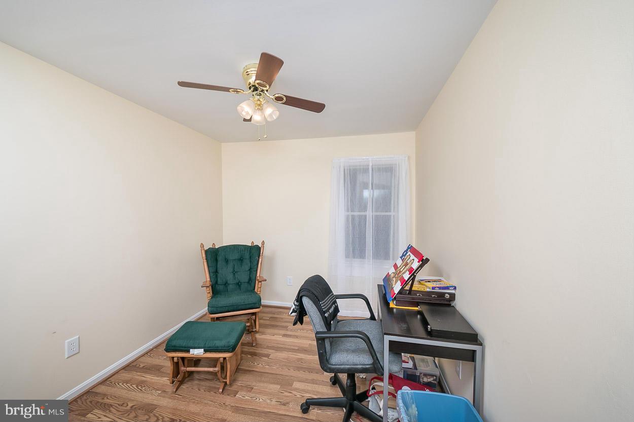 9408 Oak White Road Baltimore, MD 21236 - Photo 29 of 30 a workspace room with furniture and rug