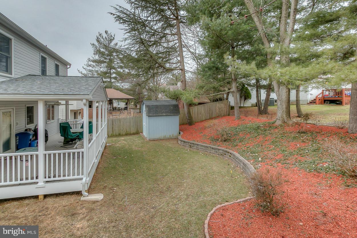 9408 Oak White Road Baltimore, MD 21236 - Photo 30 of 30 a view of a porch with a yard