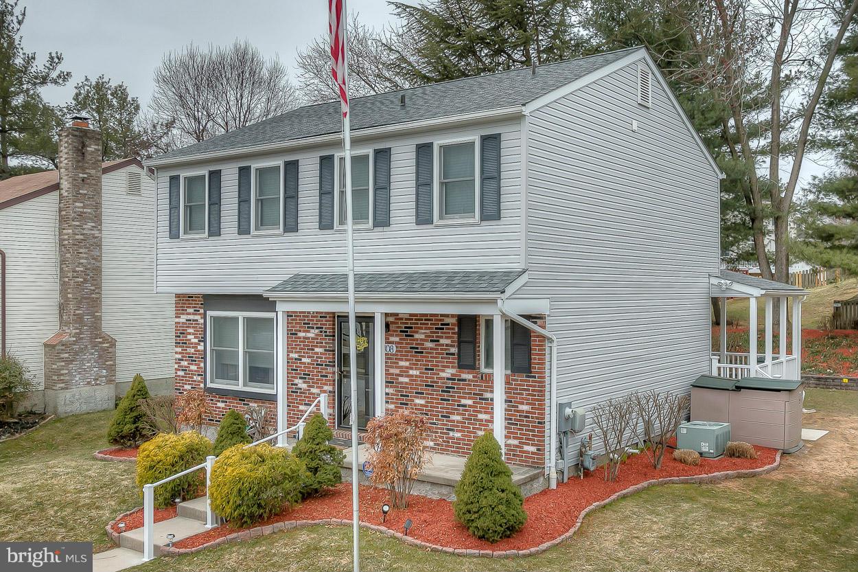 9408 Oak White Road Baltimore, MD 21236 - Photo 4 of 30 a front view of a house with garden