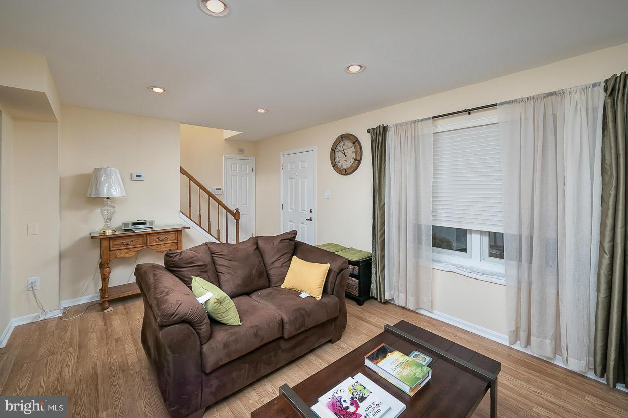 9408 Oak White Road Baltimore, MD 21236 - Photo 6 of 30 a living room with furniture and a window